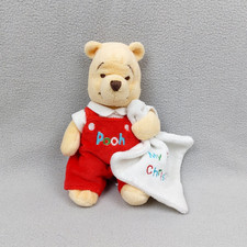 Peluche doudou Winnie l'ourson DISNEY STORE salopette rouge "my first Christmas"