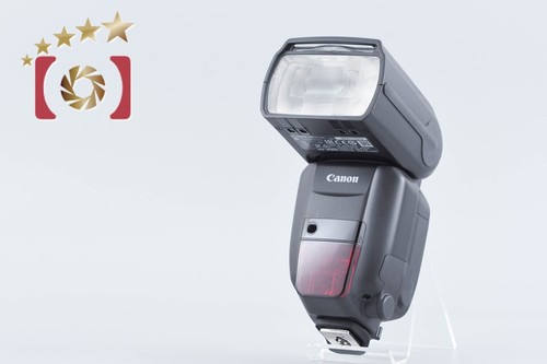 Flash griffe canon - à,