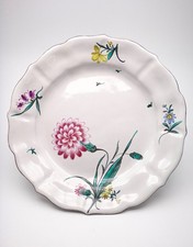 Polychrome earthenware plate thrown flowers (Marseille) 18th century