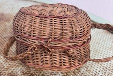 Lovely miniature wicker basket doll circa late 19th century