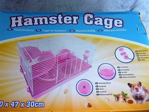 Cage rose avec roue - cage,
