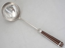 Christofle Talisman, louche à soupe métal argenté et laque de Chine Sienne.