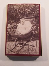 PHOTO 17X11 baby in railing clique not signed