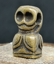 Ancienne amulette en bronze