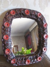 Petit miroir mural en