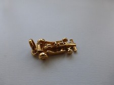 pendentif neuf voiture de course plaqué or poinçon 3,63gr 2,2x1cm (dimensions sa