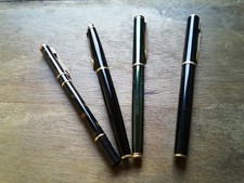 Lot de 4 anciens stylos roller