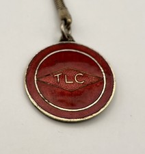 PORTE CLÉ - TLC - émaillé -