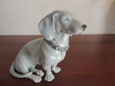 Figurine chien en porcelaine signé GP