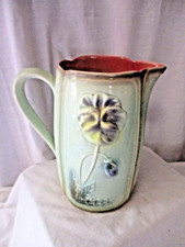 Ancien pichet en barbotine