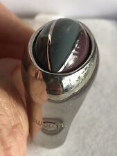 bague en métal chromé et émail à chaton pivotant de marque swatch, taille 52