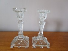 PAIR OF ANTIQUE MOLDED GLASS CANDLE HOLDERS