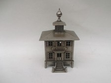 Tirelire ancienne en bronze