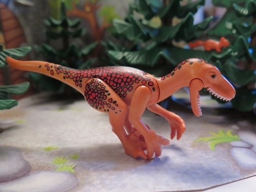 Dinosaure deinonychus orange - deinonychus,