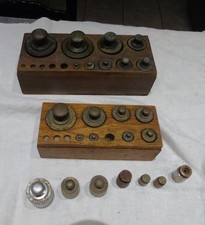 Lot de 24 poids en laiton