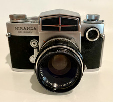 Vintage Miranda Sensorex 35mm camera with extra lenses and leather case.