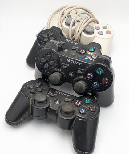 Sony lot 4 manettes - sony,