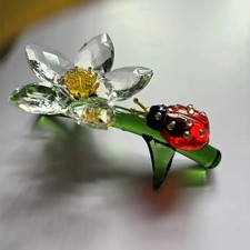 Décoration fleur et coccinelle en verre