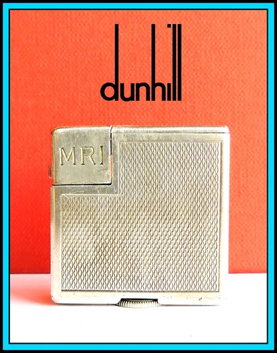 Mini briquet essence - à,
