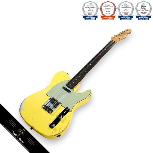 Guitare jaune canari fender - canari,