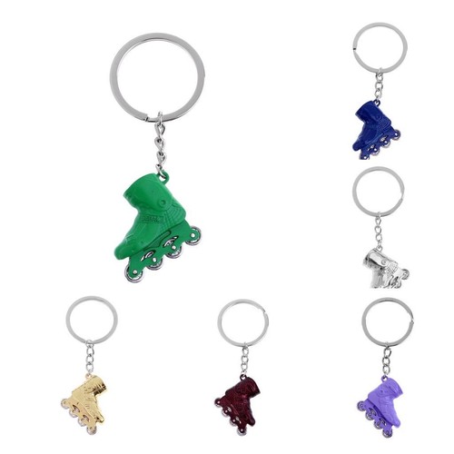 Pièce porte clé patins à - 1,