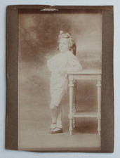 Boy leaning radiant bright proud bourgeois - old studio photo