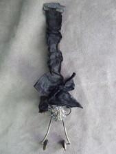 EAGLE DECOR "STREAM JUMPING" CLOTHING CLAMP. 19th century.