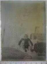 EE133 negative glass plate 1930 VGC 12x9 cm interior baby sitting on his bed