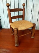 Chaise basse..Charles