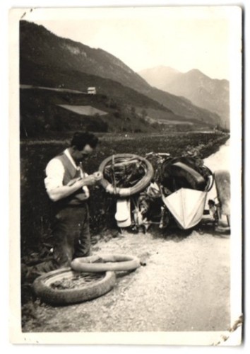 Photographie homme répare - , le
