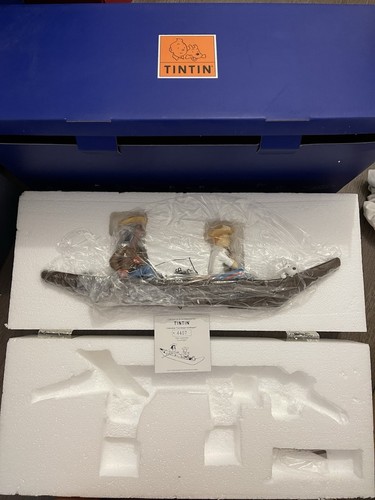 Tintin pirogue figurine - tintin,