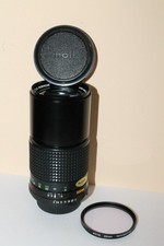 Minolta MD Rokkor 200 mm F4 + 2 bouchons  + filtre 1A
