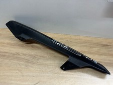 UN CACHE CARTER DE CHAINE MOTO