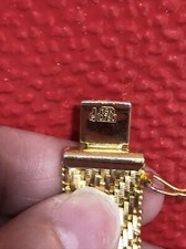 Superbe  bracelet plaqué or , Poinçon 18 Kt Poids : 53 Grs.  L: 19 Cm/ L 1.8 cm