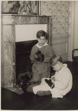Children waxing their shoes before the&#039;arrival of Santa Claus, vintage print