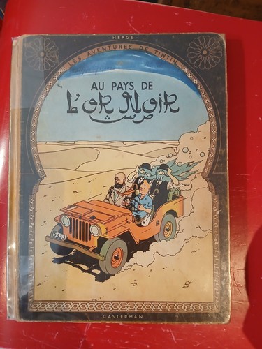 Herge tintin pays de - -, l'or