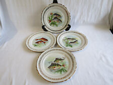 4 assiettes à poissons en porcelaine