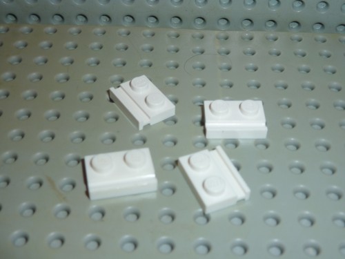 Lego white plates with - 4,