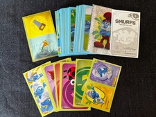 LOT PANINI 96 STICKERS  DISNEY SCHTROUMPFS VILLAGE PERDU SANS DOUBLES 2017