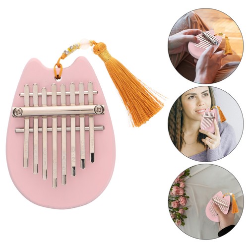 Piano pouce instrument - À, de