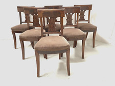 suite de chaises en acajou à décor de palmettes finement sculptée . XIX siècle .