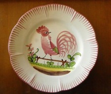 Assiette en faïence au décor au coq