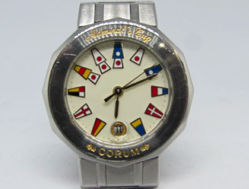Montre quartz corum - à,