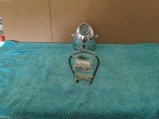 CEV 130 Headlight shell with a Veglia speedo and extra's 4 Benelli Wards NOS