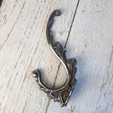 Crochet mural vintage en fonte