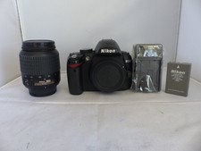 Nikon D D3000 10MP CCD. Comes