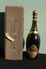 bouteille de Champagne 75 cl. C. Heidsieck vintage 1955 dans son coffret. **