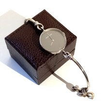 RICHARDS ZEGER Montre vintage en argent massif adaptée en quartz