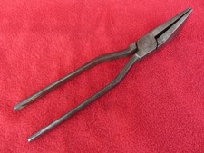 Pince a border couvreur