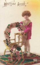 CP HAPPY YEAR LITTLE GIRL HORSESHOE FLOWERS ON CHAIR